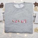 Kirby Eating Santa Shirt: Festive Game Character Hoodie & Sweatshirt