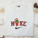 Baby Grinch Santa x Nike Embroidered Sweatshirt – Festive Movie Christmas Shirt Perfect Gift Idea