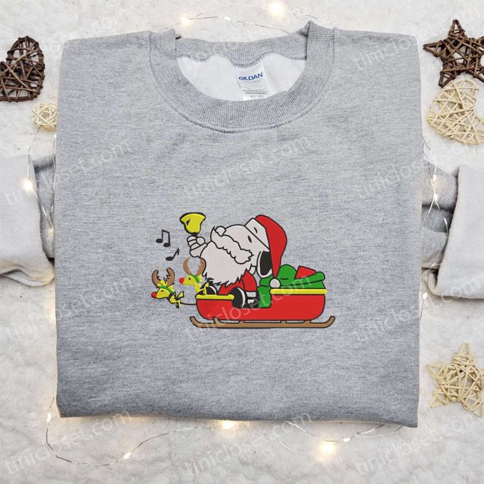 Snoopy Santa Riding Sleigh Shirt Hoodie & Sweatshirt: Festive Cartoon Embroidery for Christmas