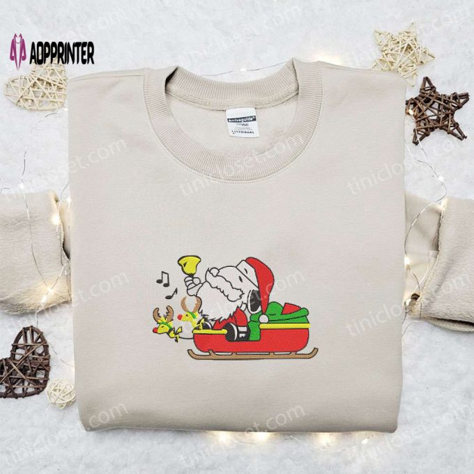 Snoopy Santa Riding Sleigh Shirt Hoodie & Sweatshirt: Festive Cartoon Embroidery for Christmas